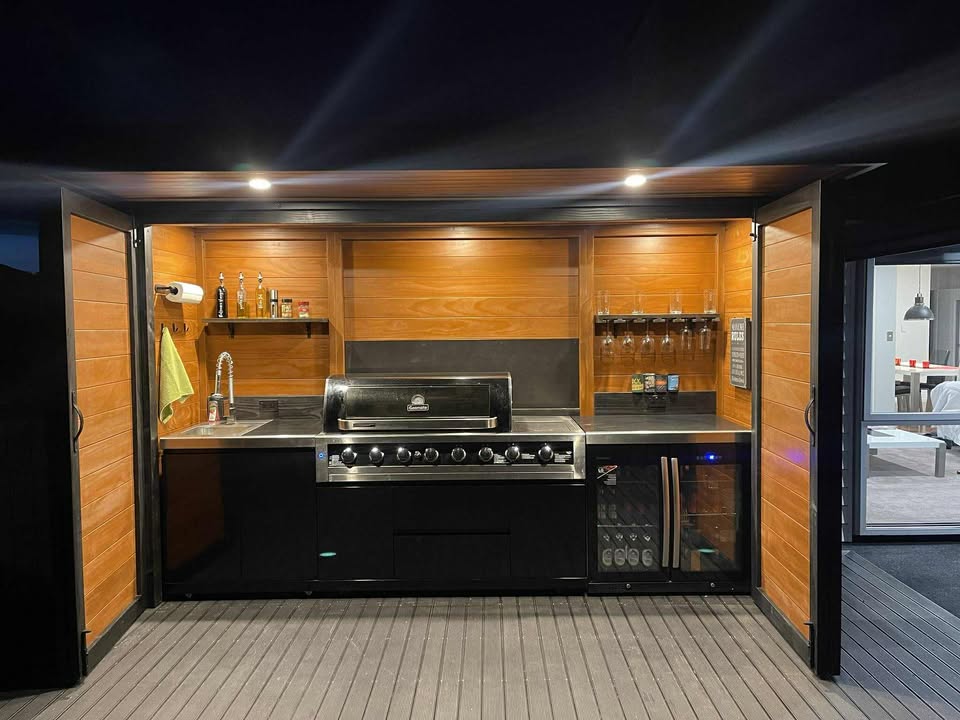 3.5m wide Custom BBQ Enclosure with Bifold Barn Style Doors and cantilever canopy.
