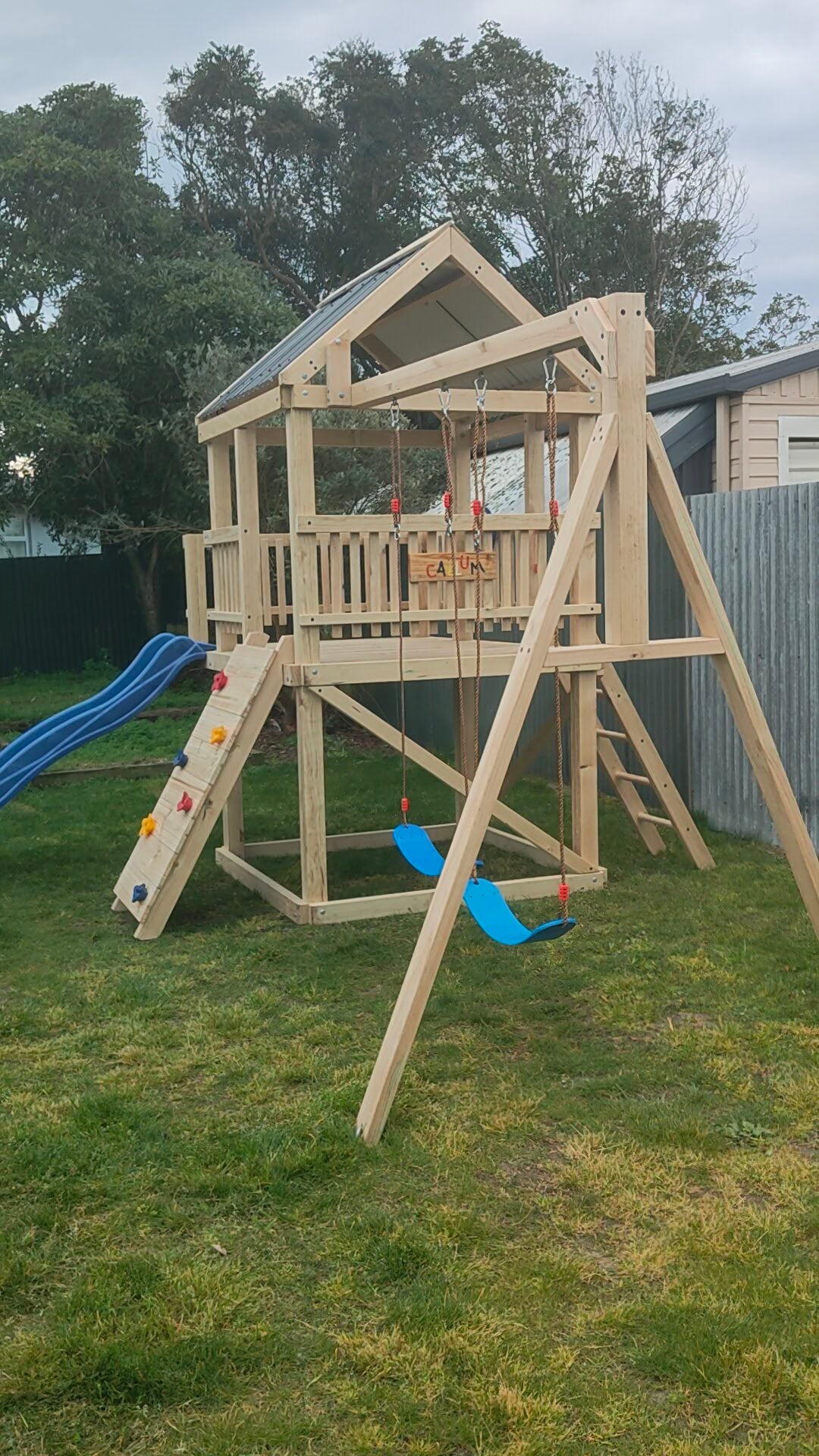 1.5m x 1.5m Playground Tower (#10) - balcony version, rock wall, wave slide and swings