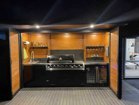 3.5m wide Custom BBQ Enclosure with Bifold Barn Style Doors and cantilever canopy.