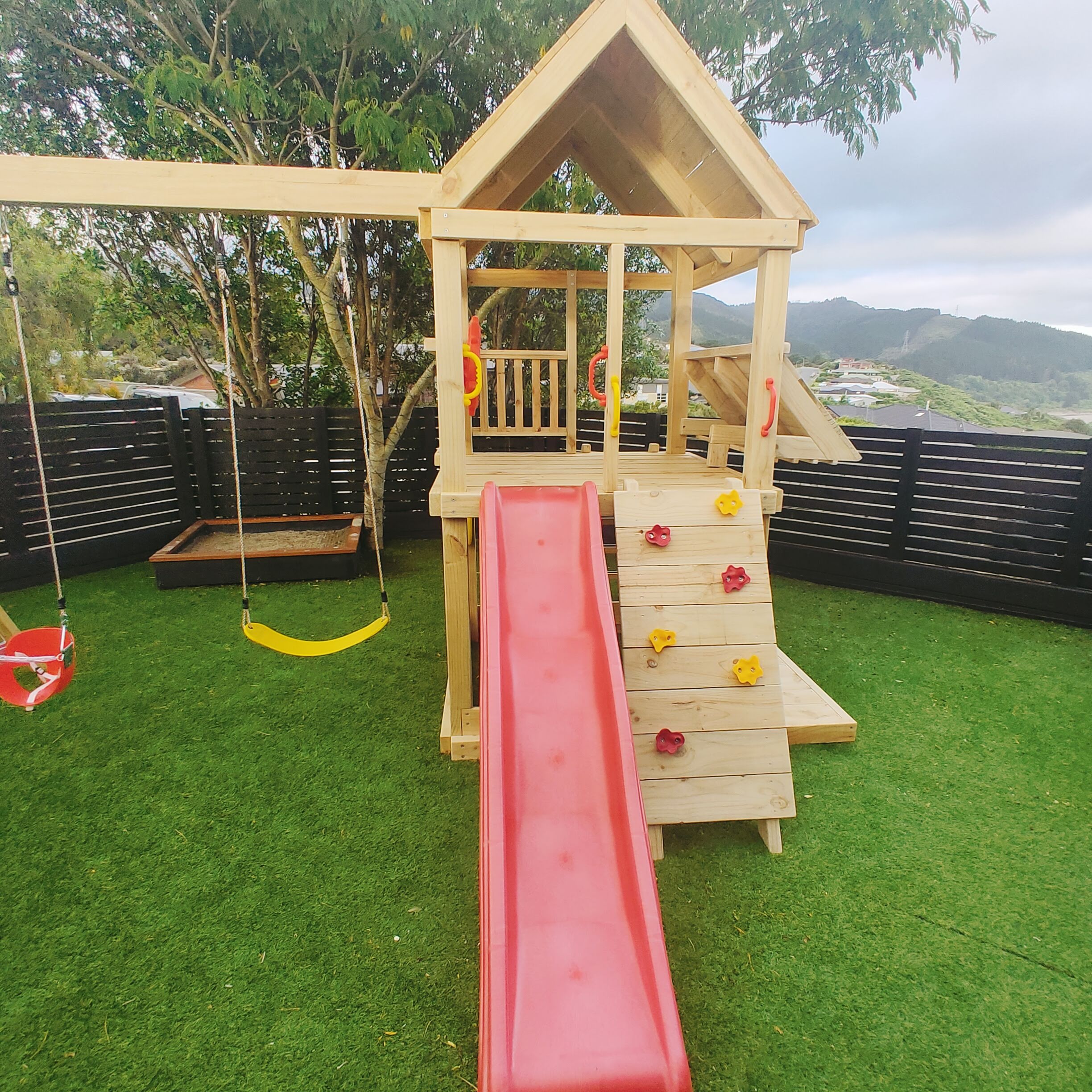 Large 1.5mx1.5m Play Tower (#4) - with slide, shopfront, rock wall, sandpit and swings