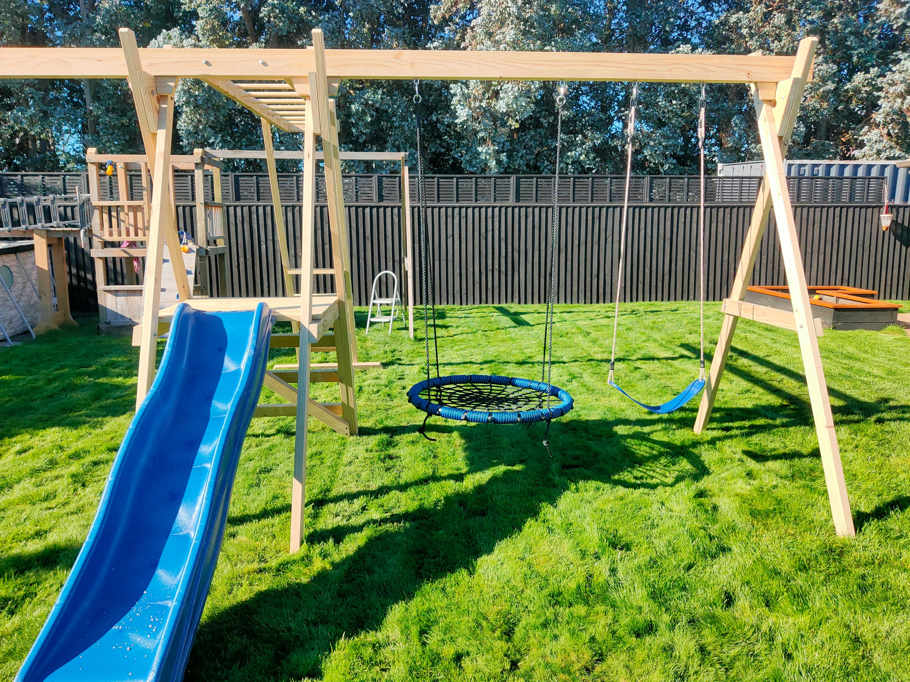 Small Wooden Playground Set with Monkey Bars, Slide & Net Swing