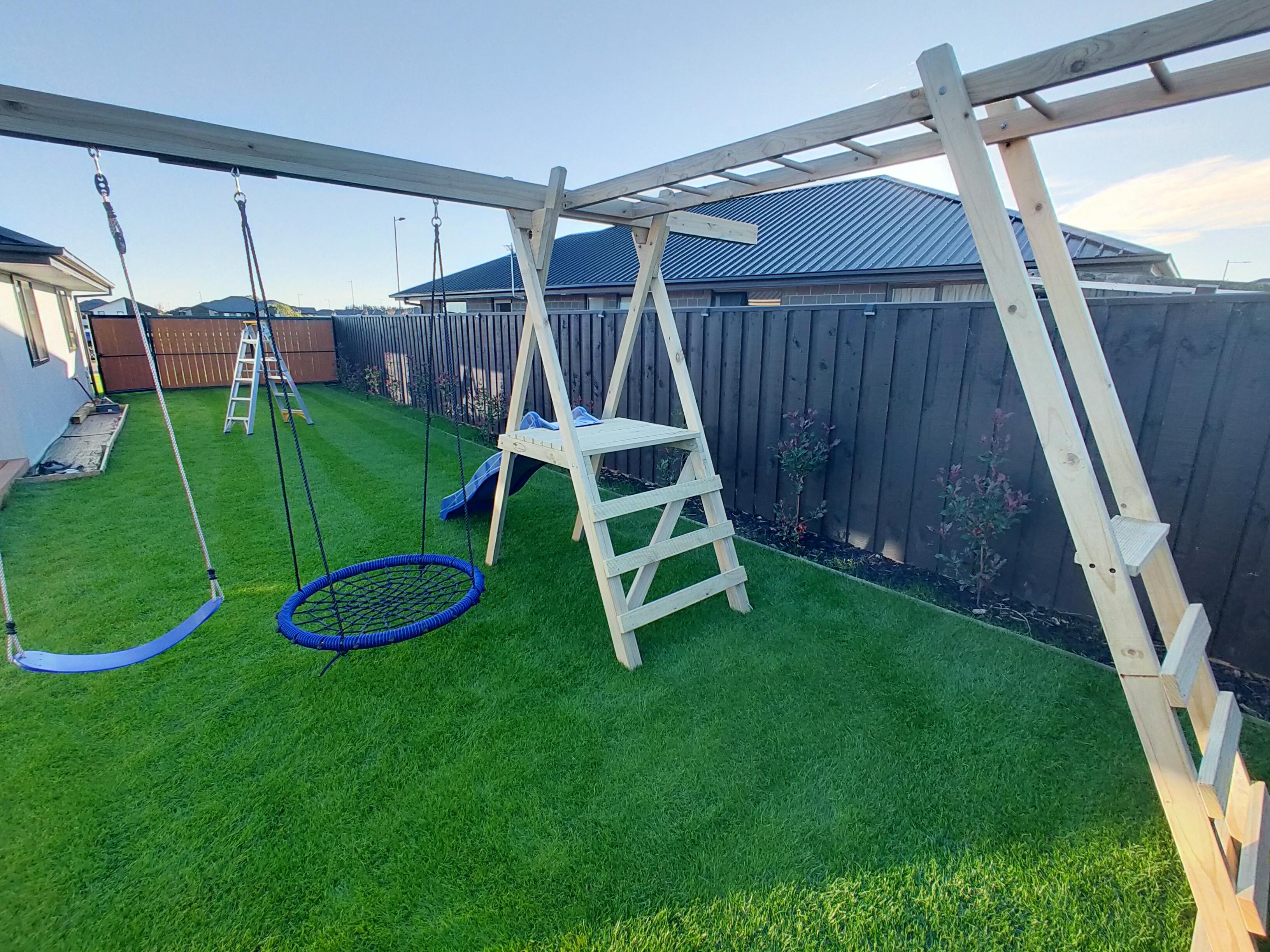 Small Wooden Playground Set with Monkey Bars, Slide & Net Swing