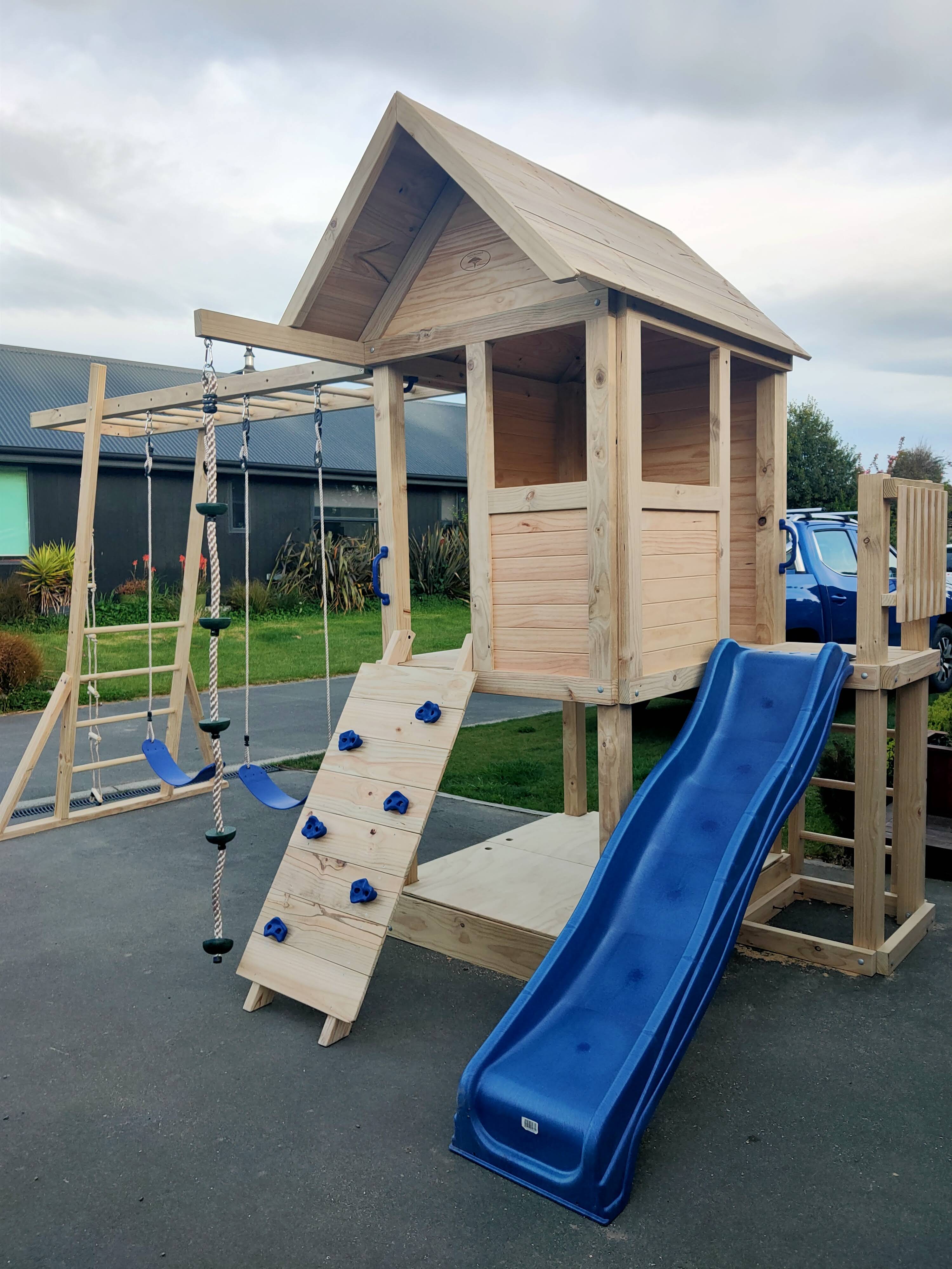 Medium 1.5mx1.2m Play Cubby Tower (#1)- Monkey bars swing beam, wave slide with platform, rock wall and sandpit with cover