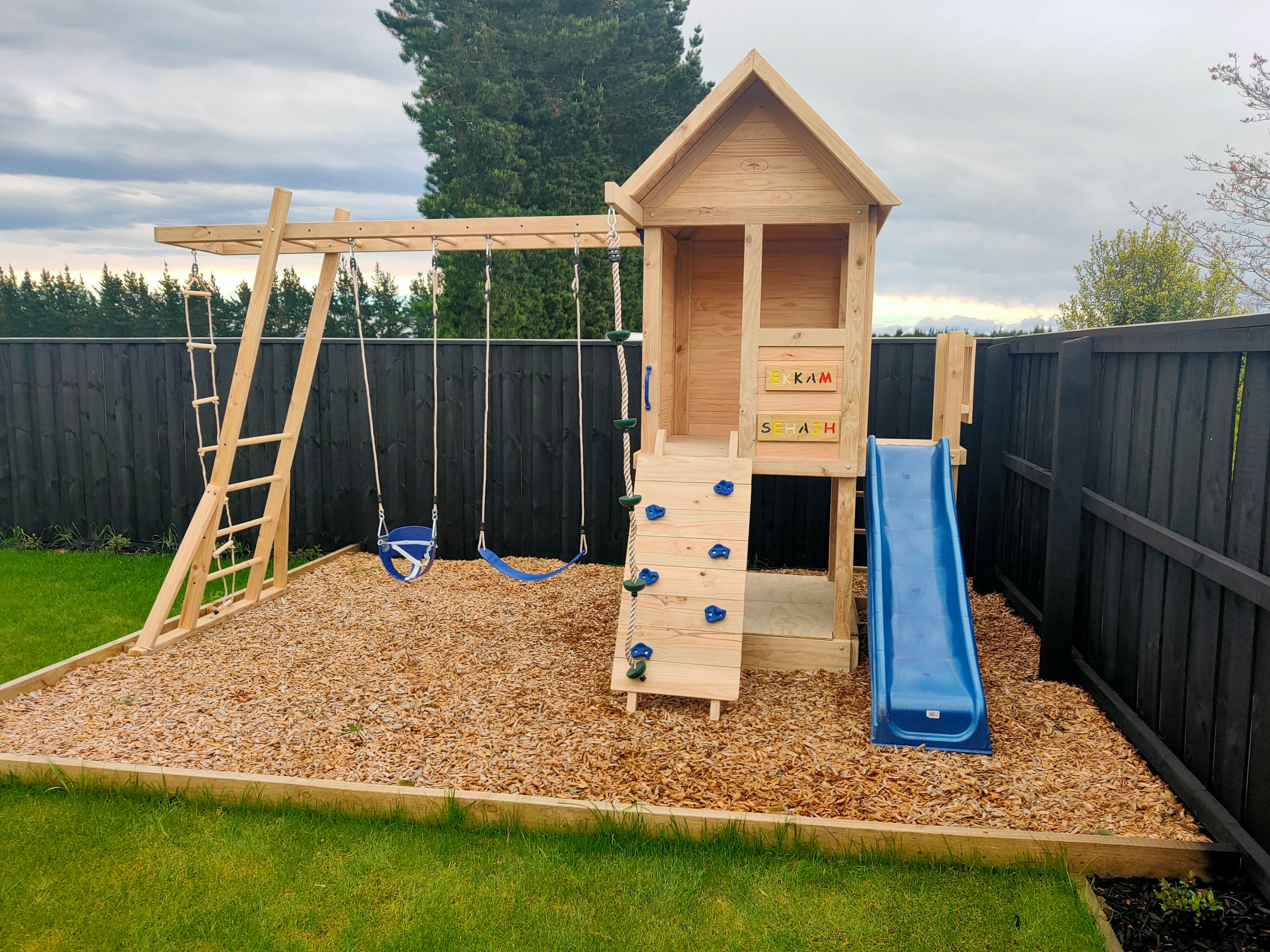 Medium 1.5mx1.2m Play Cubby Tower (#1)- Monkey bars swing beam, wave slide with platform, rock wall and sandpit with cover
