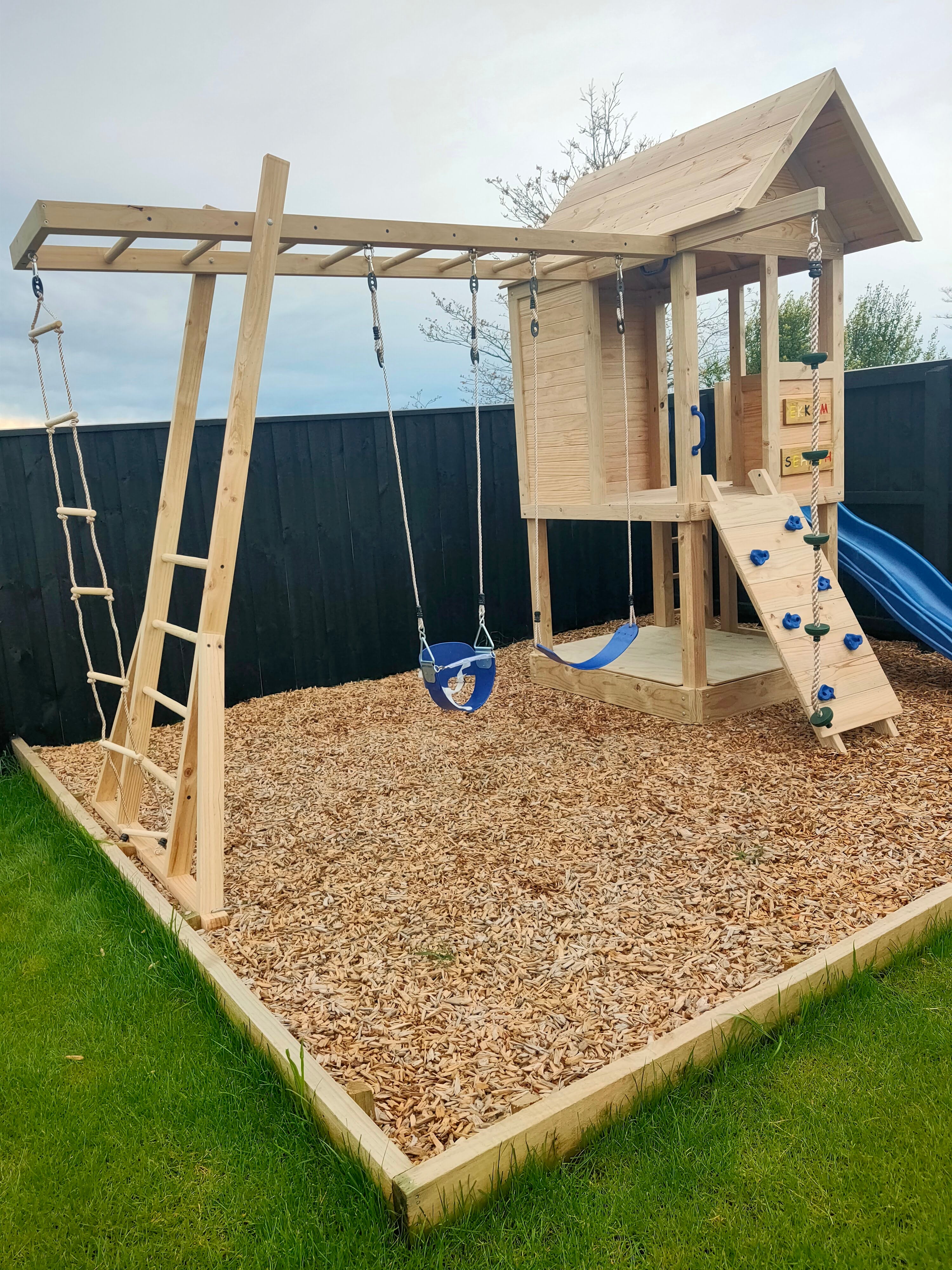Medium 1.5mx1.2m Play Cubby Tower (#1)- Monkey bars swing beam, wave slide with platform, rock wall and sandpit with cover